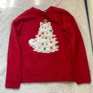 A red sweater from children place